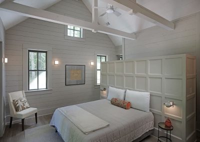 The primary suite headboard wall creates a clever closet. Ellijay, Georgia